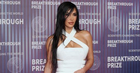 Kim Kardashian at an event as she faces legal proceedings over a mistaken identity defamation case.