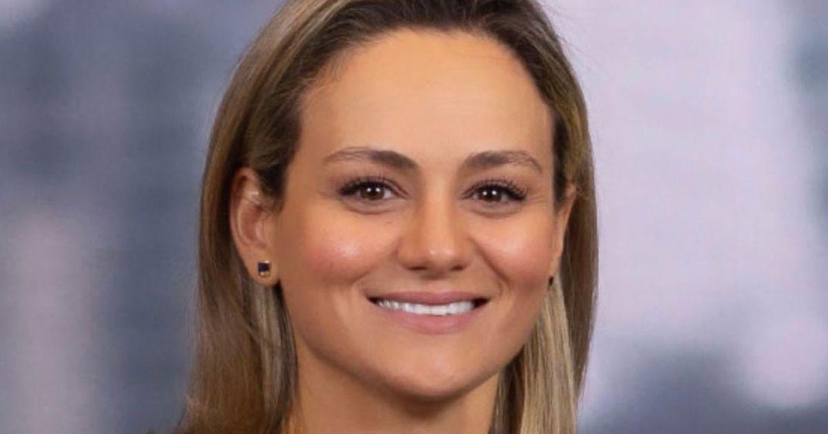 The senior executive reportedly threatened her junior for forced acts