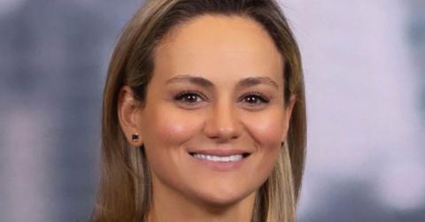 The senior executive reportedly threatened her junior for forced acts