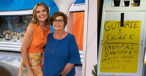 Pima County detectives collect yellow sign boards as evidence near Nancy Guthrie’s home in Tucson.