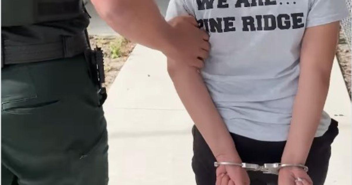 Child being taken into custody.