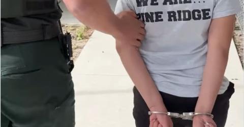 Child being taken into custody.