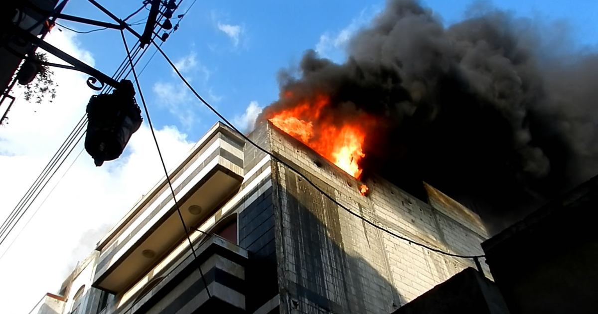 Four Killed in House Fire; Man Charged with Second-Degree Murder