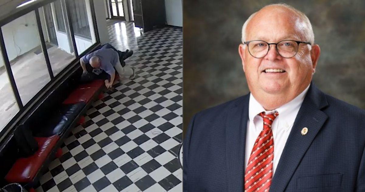 Kirk Moore, principal of Pauls Valley High School, restrains an armed former student in the school lobby after tackling him during an attempted shooting incident.