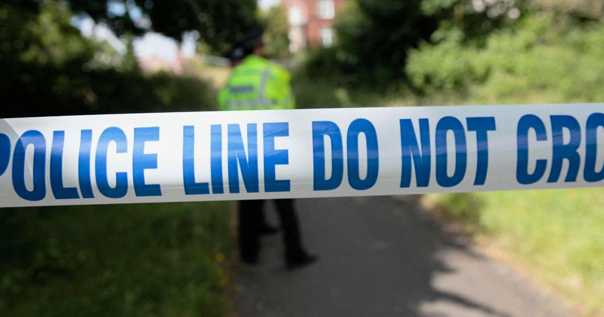 A representational image of a police line at a crime scene.