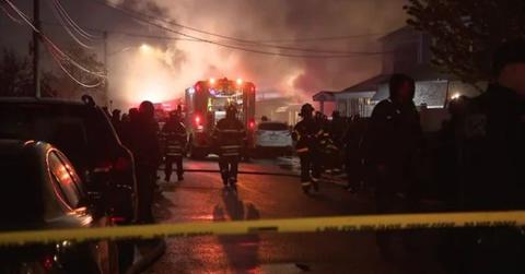 Massive house explosion in Queens shows officers flying away from the house