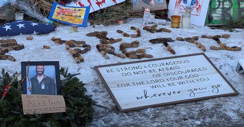 A photo of some of the items left at the site of Alex Pretti's death.