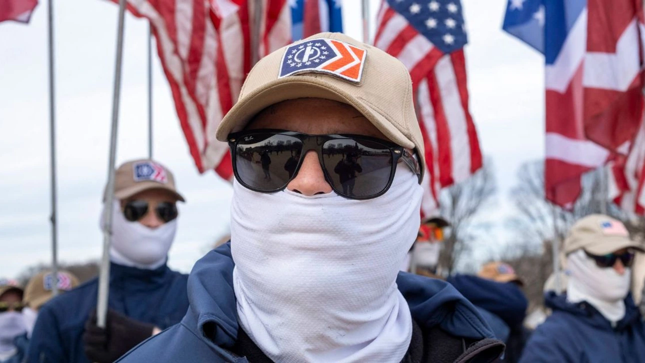 Patriot Front Members in Masks Surround Black Woman on D.C. Train as